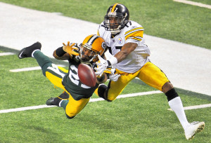 charles-woodson-mike-wallace-super-bowl-45